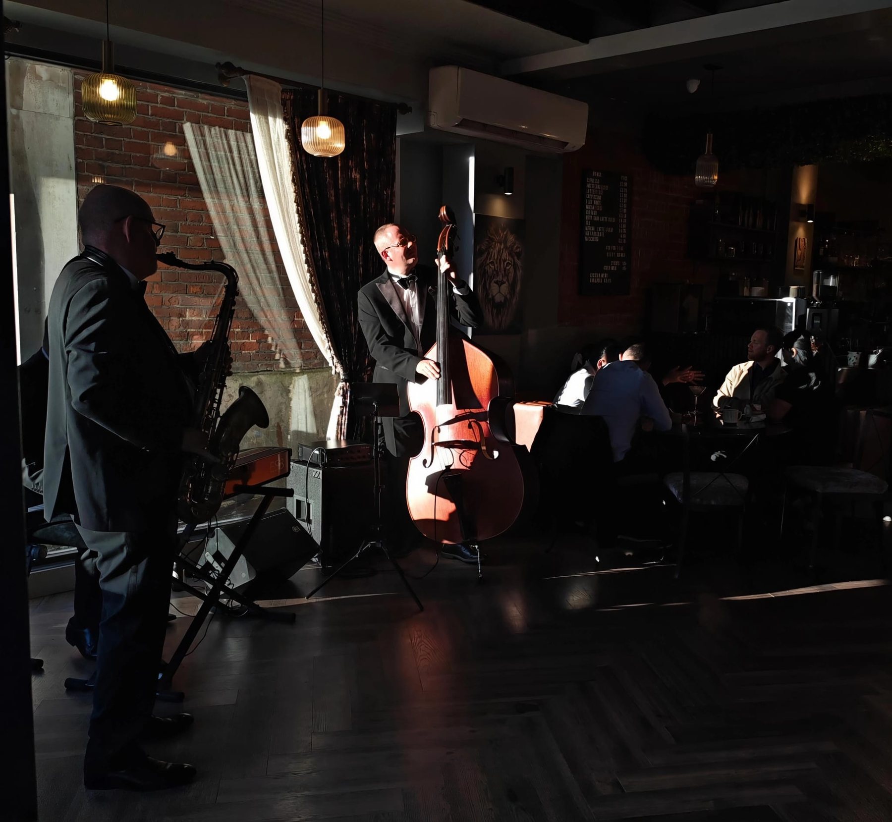 Live jazz musicians performing at The Aslan Lounge
