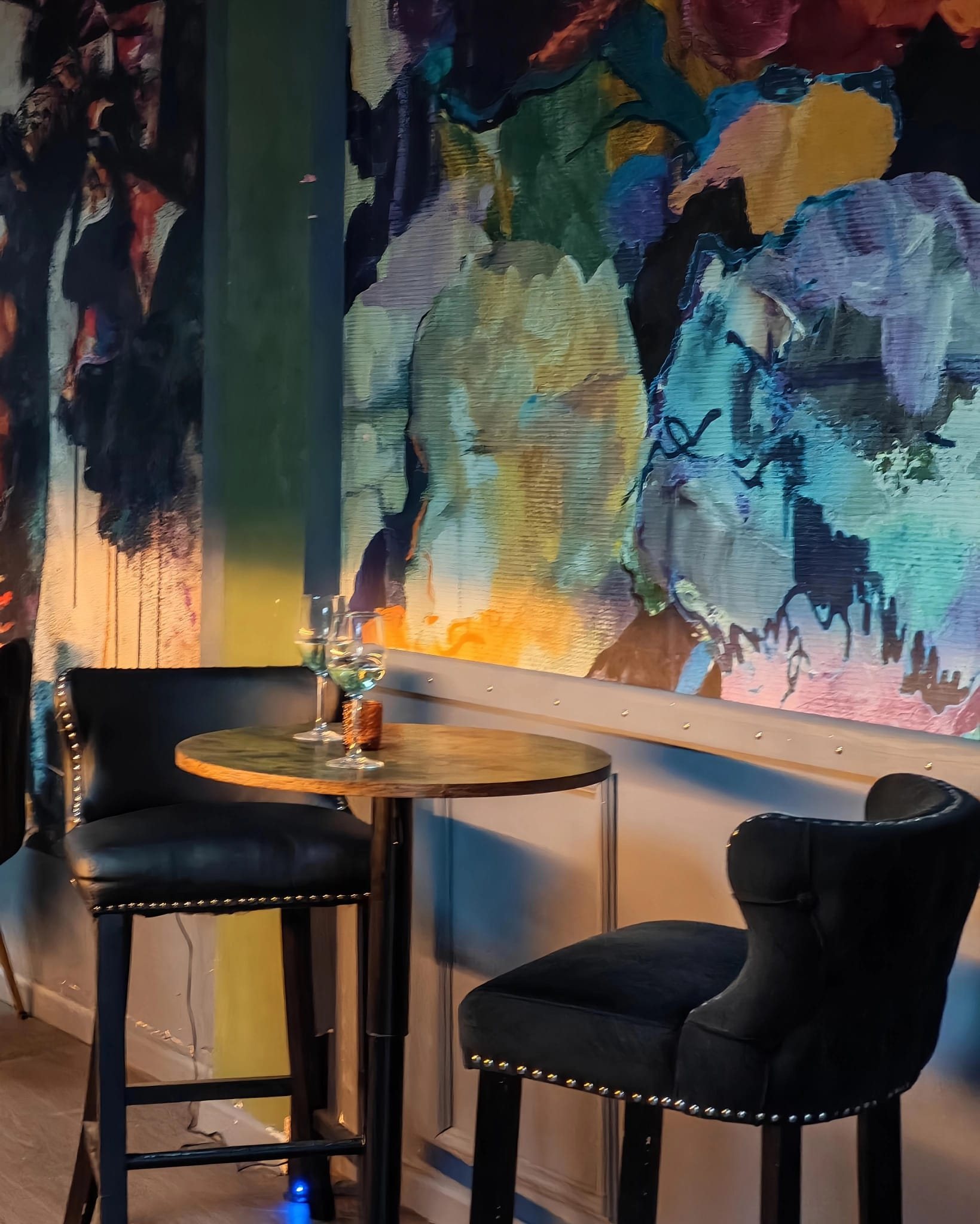 The Aslan Lounge artwork and intimate seating
